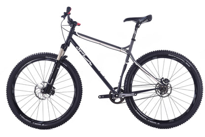 USED Spot Honey Badger XL Single Speed Belt Drive Steel Hardtail Mountain Bike 29"